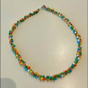 Unique seed bead spring bag necklace